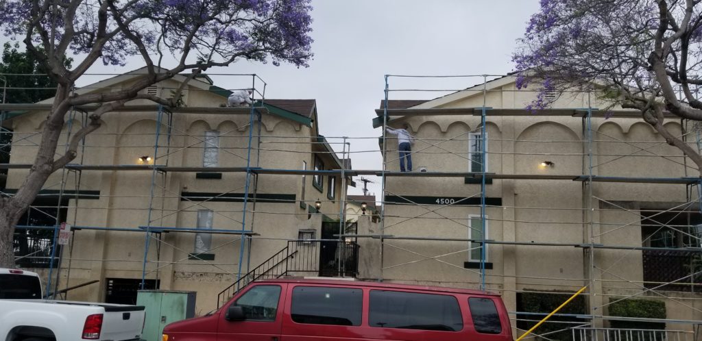 Kaz painters on the job with scaffolding